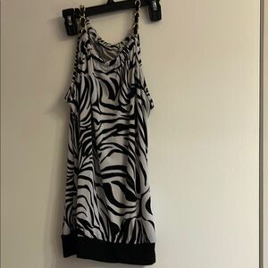 Candy Rain Zebra Print Sleeveless Top, gold chain on leather at shoulder.